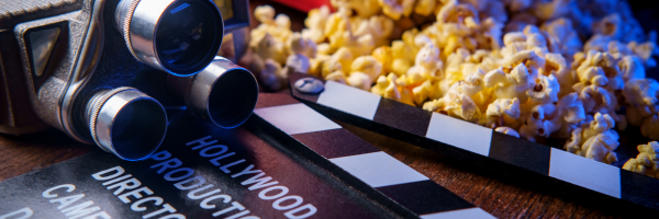 Film camera, clacker, and popcorn.